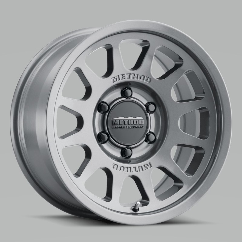 MR703 15x7 +15mm Offset 5x100 56.1mm CB Gloss Titanium Wheel - Click Image to Close
