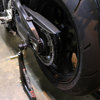 Black Swing Arm Spools - Fits Most Kawasaki ZX/EX w/ 10mm Bolts